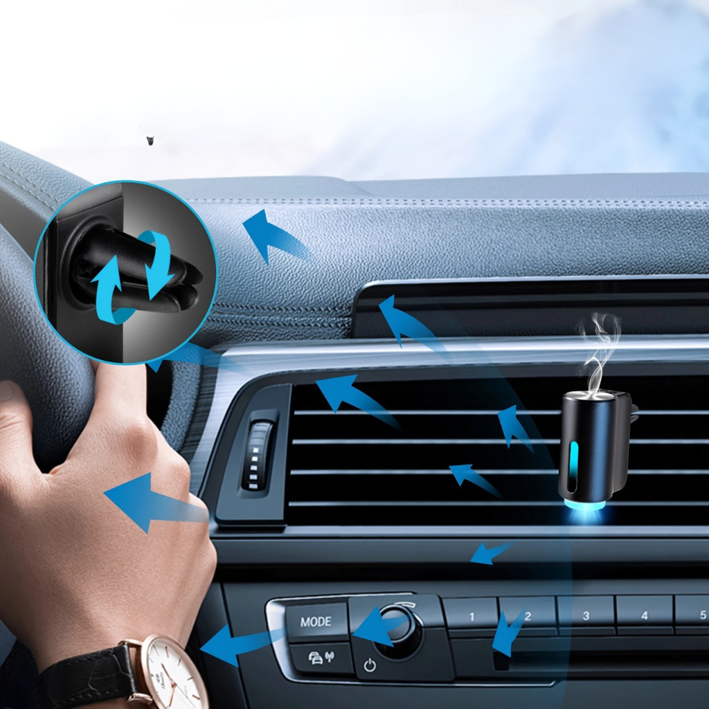 Car air freshener being inserted into a car's air vent with blue arrows indicating airflow.
